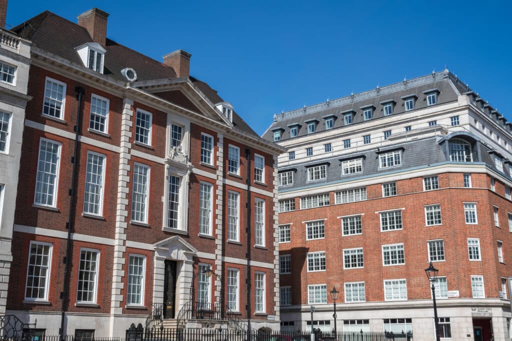 London, UK - 22 April, 2024 - The Medical College Of Saint Bartholomew's Hospital Trust (left) and the Center for Commercial Law Studies (right) in Lincoln's Inn Fields, Holborn